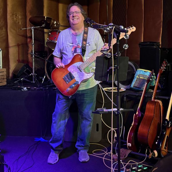 Mark lead guitar and vocals